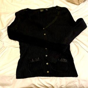 Adorable black cardigan with satin accent on pockets. Esprit size small